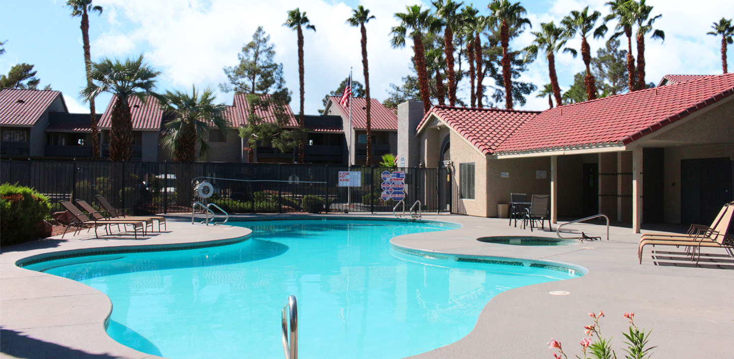 This banner image shows the swimming pool of Silver Palms Apartments.